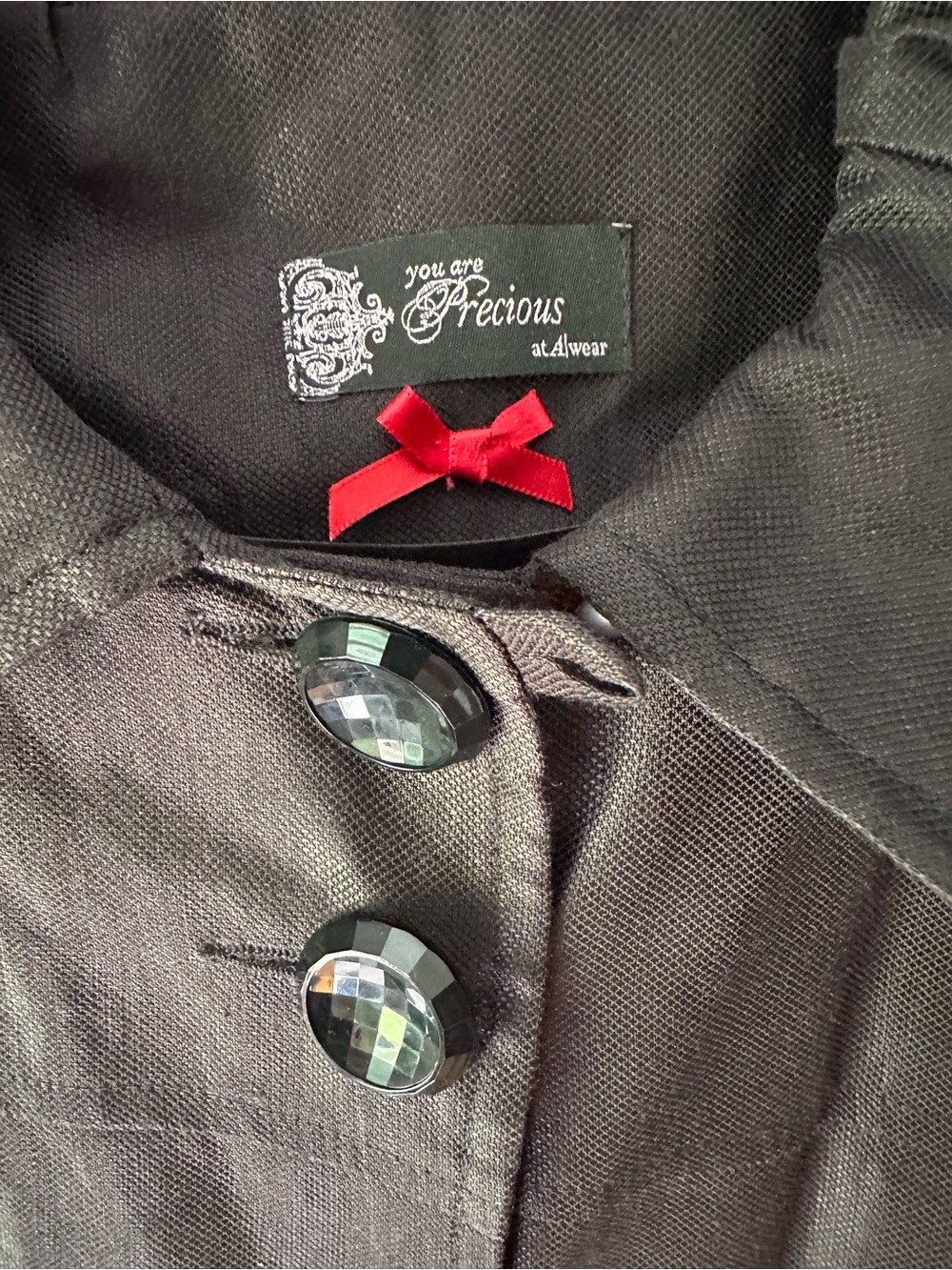 Black Coat with Decorative Buttons